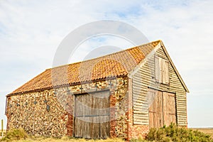Old coal barn. Thornham Old Harbour, England, UK.