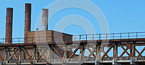 Old coal-fired power station with blue sky, panoramic format