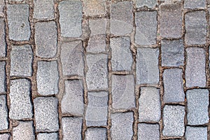 Old cobblestone road pavement texture