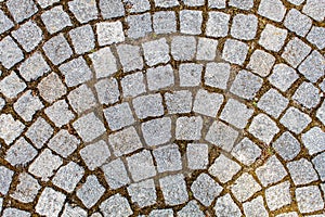 Old cobblestone road pavement texture