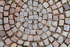 Old cobblestone road pavement texture