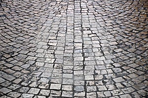 Old cobblestone street background texture light reflection backlight