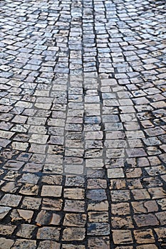 Old cobblestone street background texture vertical