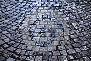 Old cobblestone street dark night background texture