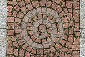 Old cobblestone tile texture in old town. City pavement background. Abstract granite stone brick pattern. Street sidewalk texture