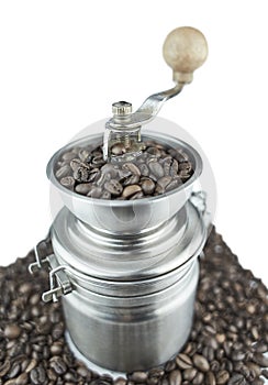 Old Coffee Grinder with Coffee beans, isolated on white