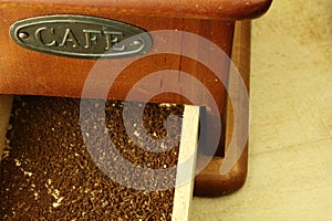 Old coffee grinder brown in color