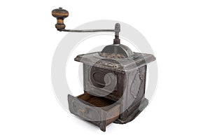 Old coffee grinder and coffee beans