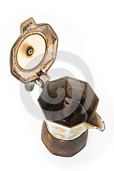 Old coffee maker called `moka` or `mocha` for italian coffee espresso with open lid on white background.