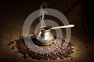 Old coffee pot with smoke