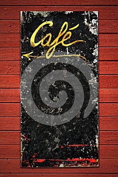 Old coffee sign in weathered metall