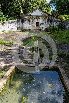 Old colonial fountain of Mirititiua at Alcantara, Brazil photo