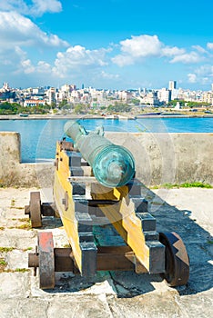 Old colonial spanish cannon aiming at the city of Havana