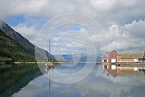 Old colored houses and boat in Mosjoen, Norway