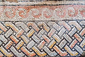 Old colored mosaic floor in Roman Catholic church Dominus Flevit. Fragment, details. Jerusalem, Israel