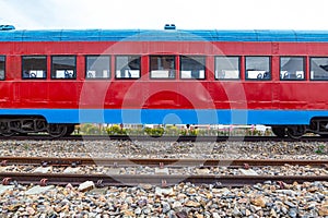 old colored train on the railroad