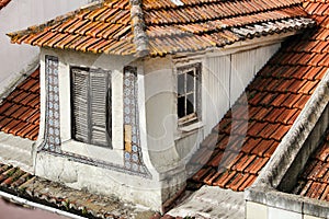 Old and colorful facade and roof in Lisbon