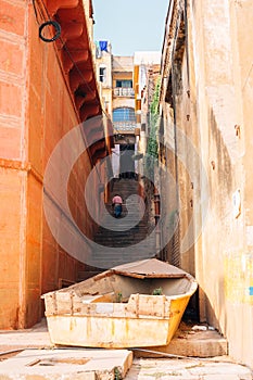 Old colorful buildings and Ganges river ghat street in Varanasi, India