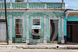 Old colorful colonial cafe in the center of Trinidad, Cuba photo