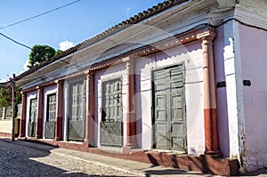 Old colorful colonial house in the center of Trinidad, Cuba photo