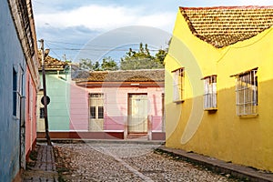Old colorful colonial houses in the center of Trinidad, Cuba photo