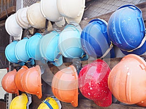 Old colorful construction helmets