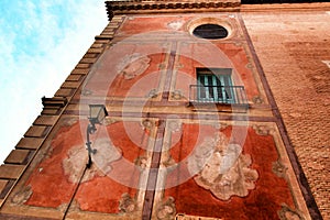 Old colorful Episcopal Palace facade in Murcia