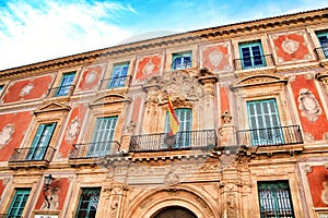 Old colorful Episcopal Palace facade in Murcia