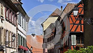 Colorful half-timbered houses with  storks nest.