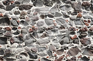 Old colorful stone wall closeup