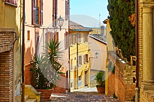 Old colorful street in Santarcangelo di Romagna in Italy photo