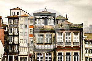 Old colorful tiled facades in Porto city