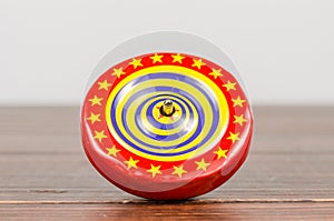 Old colorful wooden spinning top toy