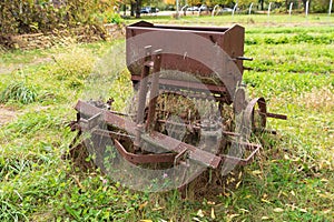 an old combine harvester on the farm