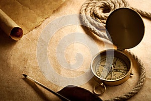 Old compass on antique paper