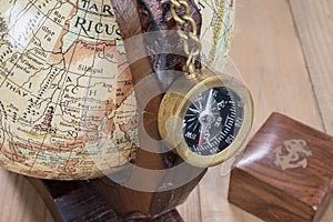 Old compass and globe