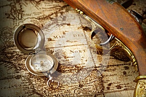Old compass on vintage map