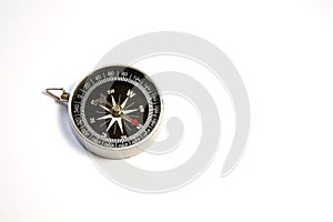Old compass on a white background.