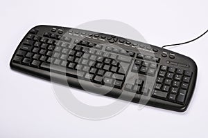 Old computer keyboard isolated on white