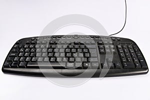 Old computer keyboard isolated on white