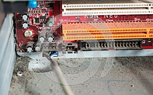 Old computer system unit with dust and spiderweb inside