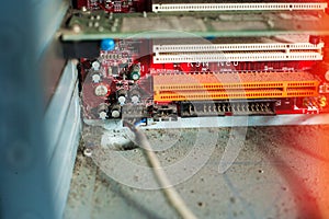 Old computer system unit with dust and spiderweb inside