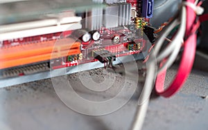 Old computer system unit with dust and spiderweb inside