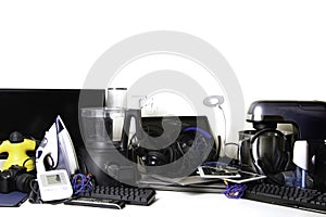 Old computers, digital tablets, mobile phones, many used electronic gadgets devices, broken household and appliances