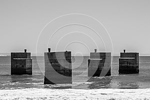 Old concrete pillars at Humewood beach in the city of Port Elizabeth, South Africa