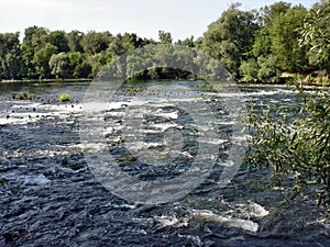 An old concrete retaining dam on the Seim River, Kursk Region.