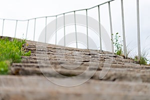 Old concrete stairway to heaven with railings