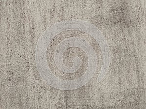 An old concrete wall with detailed texture. Beige grunge background, weathered cement wall.