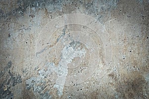 Old concrete wall with stains. Gray vignette background