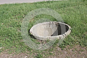 Old concrete well at the outskirts of the town